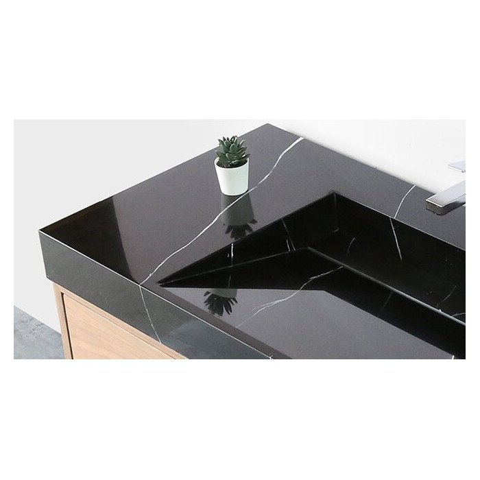 The sink is mounted on the VITRAZ furniture, 1220 x 559 mm, black marble.