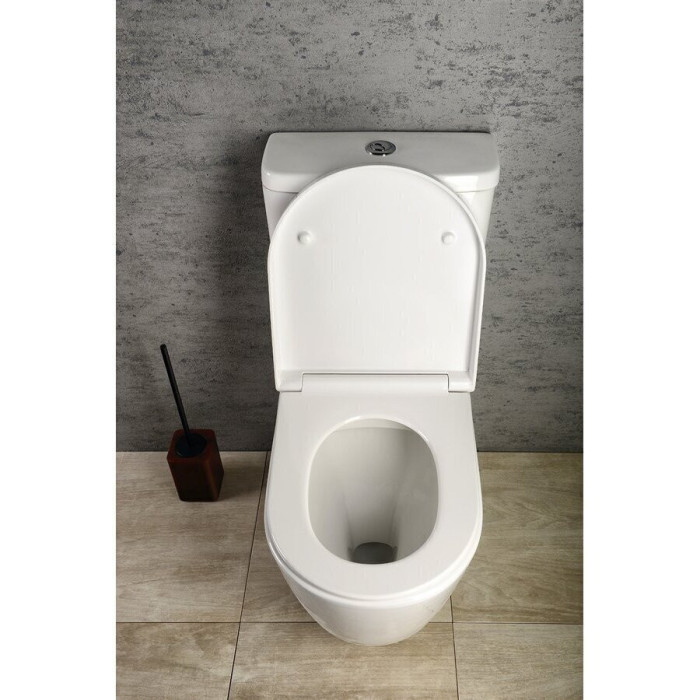 The SAPHO Turku Rimless unit with a slow-closing lid is being installed.